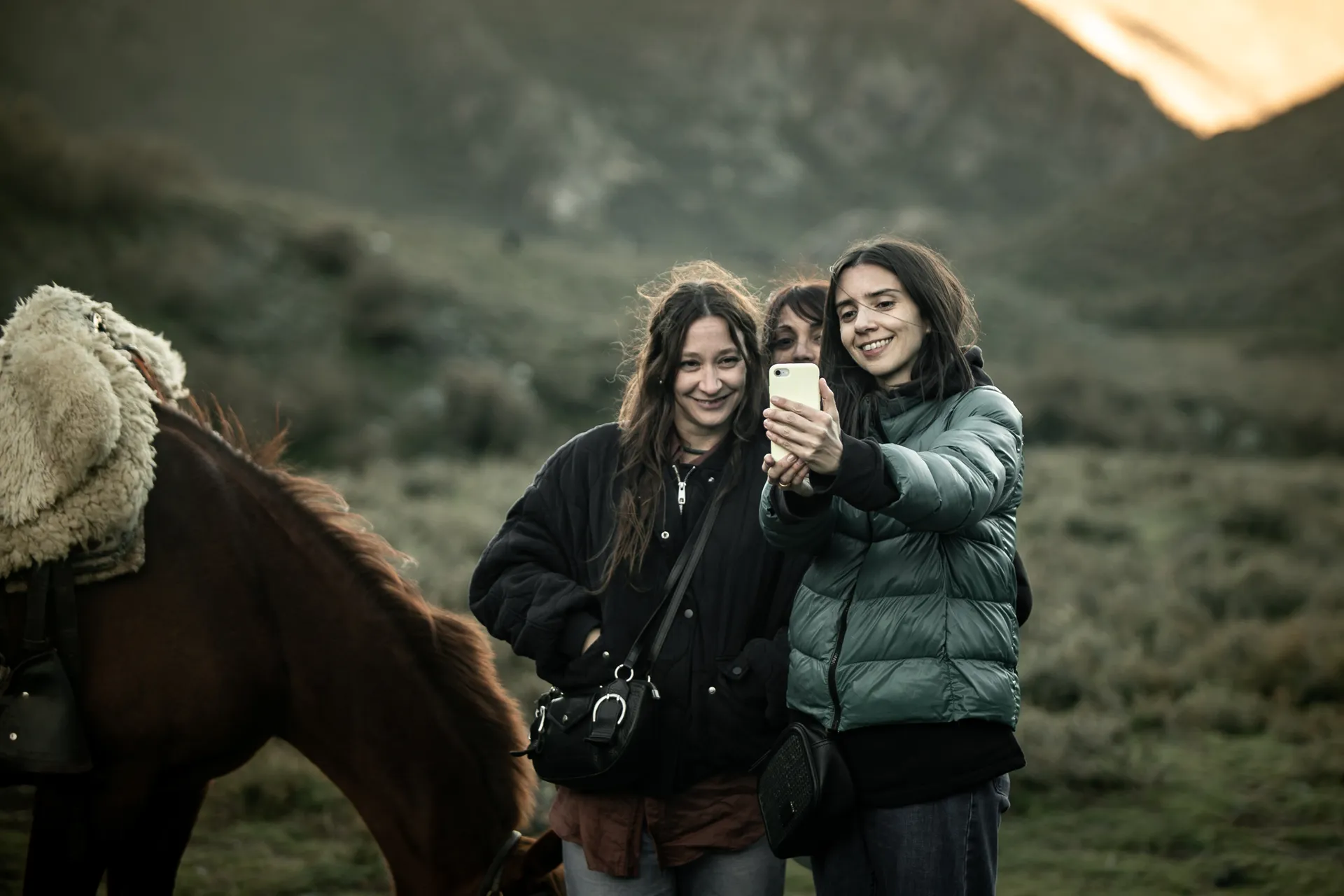 Horseback riding at sunset in the Andes Horseback riding at sunset in the Andes