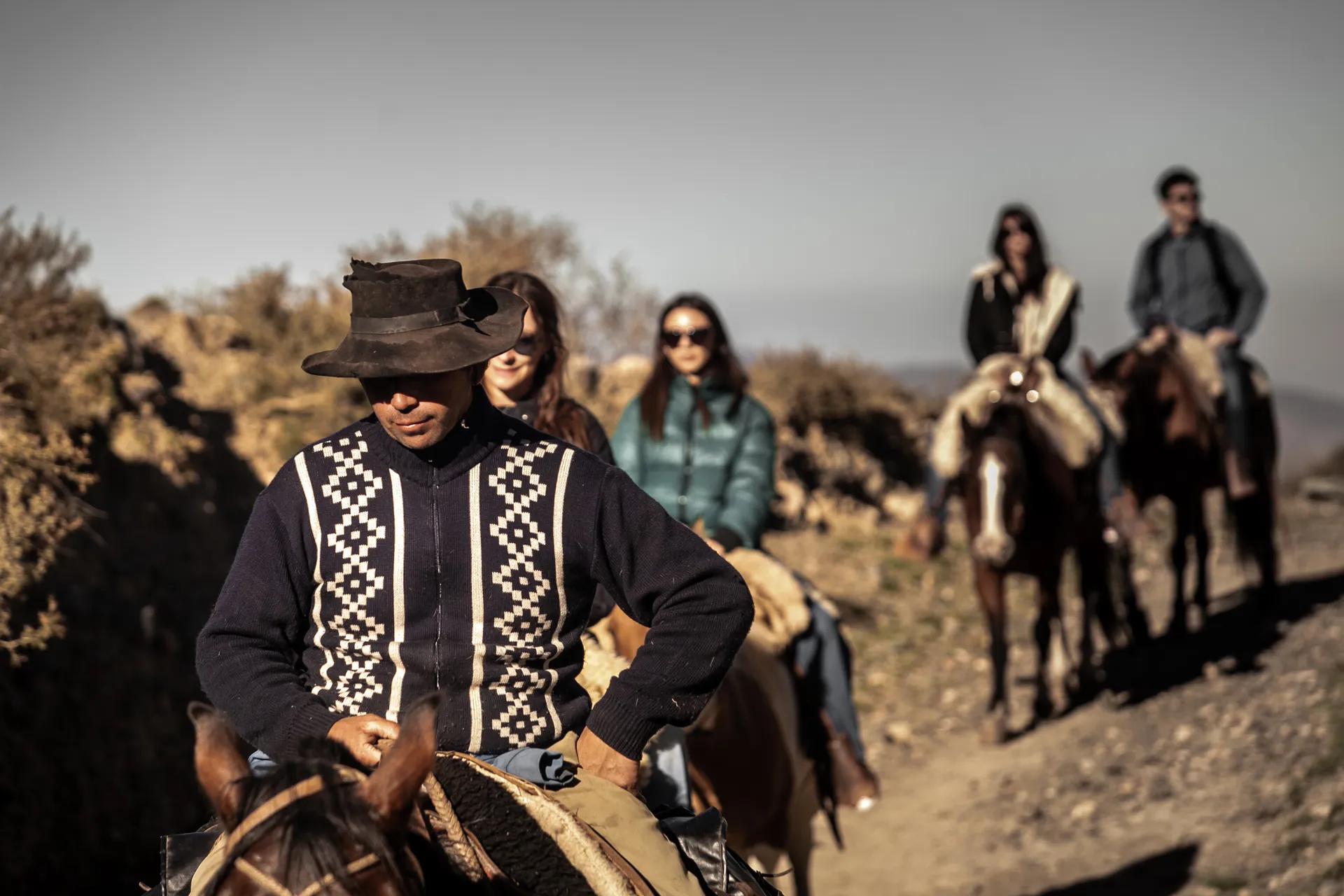 Horseback riding at sunset in the Andes Horseback riding at sunset in the Andes